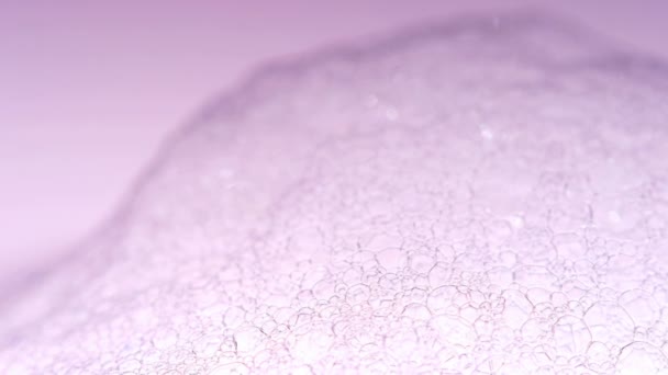 Soap Bubbles Macro shoot. Clean soft elegant bright photo background. Close-up Soap bubbles colors. Washing disinfection. Froth Backdrop. Shoot on Red Dragon camera. - Footage, Video