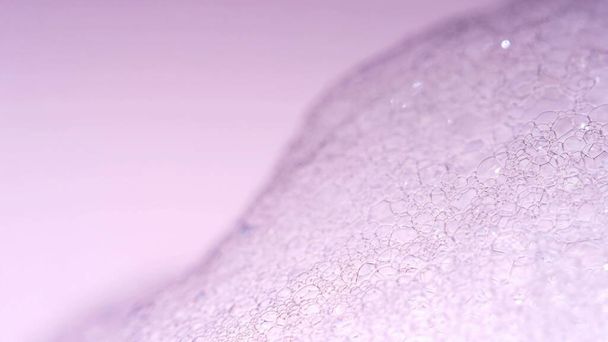 Foam Macro shoot. Clean soft elegant bright photo background. Close-up Soap foam popping bubbles. Washing disinfection photo. Froth Backdrop. Shoot on Red Dragon camera still. - Photo, Image