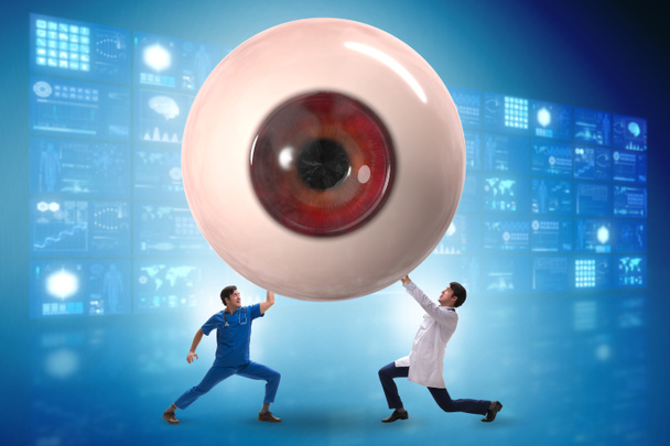 Dokter onderzoekt reusachtig oog in medisch concept - Foto, afbeelding