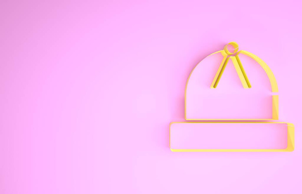Иконка желтой зимней шляпы на розовом фоне. Концепция минимализма. 3D-рендеринг - Фото, изображение