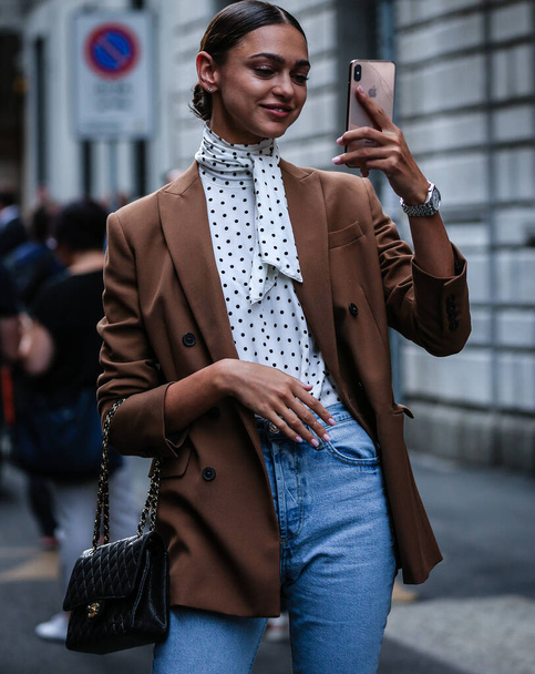 MILAN, Italy- September 21 2019: Model on the street during the Milan Fashion Week. - Фото, изображение