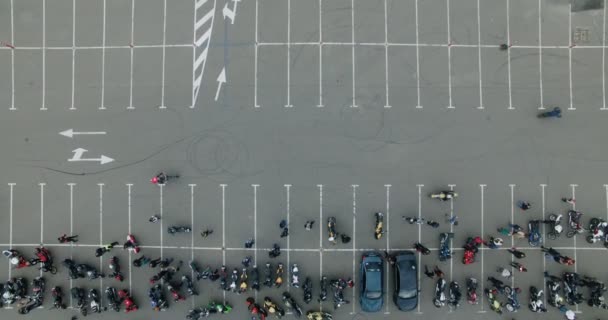 Party motorcyclists in the parking lot - Felvétel, videó