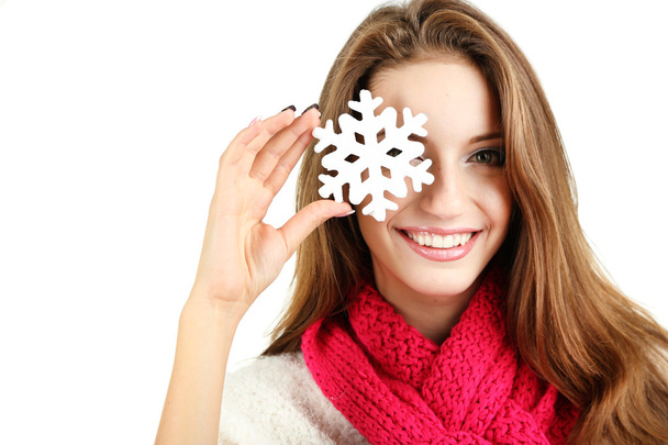Beautiful smiling girl with Christmas snowflake isolated on white - Photo, Image