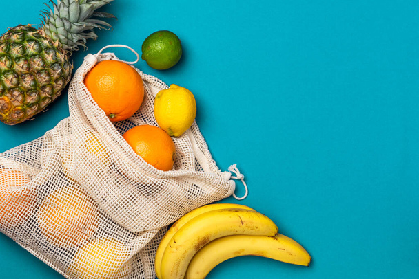 Reusable Eco Friendly Shopping Bag with Fruits. Ecology and Recycling Trend in Fashion Concept. - Fotó, kép