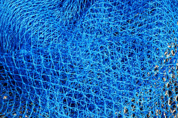 Fondo de redes de pesca de color azul comercial. Vista superior
 - Foto, Imagen