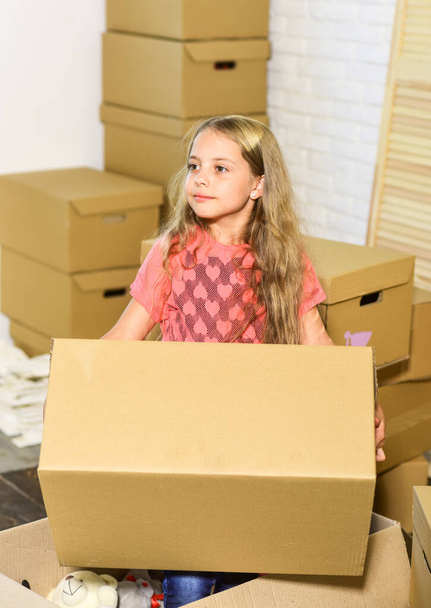 Apartment for family. Moving out. Girl child play box. Prepare for moving. Packaging things. Excited about new house. Sweet home. Move out concept. Rent house. Family house. Delivering service - 写真・画像