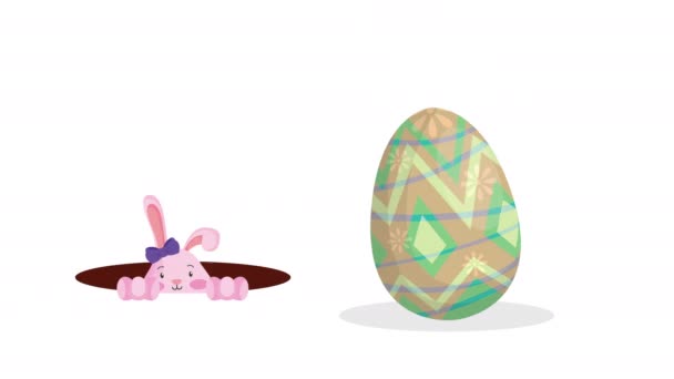 szczęśliwy Wielkanoc animowana kartka z żeńskim królikiem i jaj malowane - Materiał filmowy, wideo