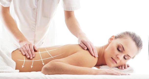 Young attractive woman getting spa treatment over white backgrou - Φωτογραφία, εικόνα