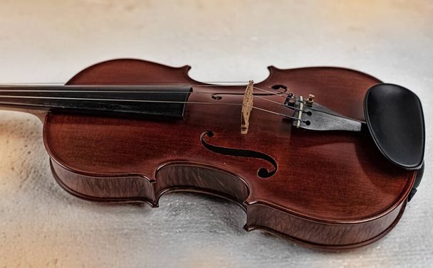 The abstract art design background of violin front side,put on grunge surface background,blurry light around - Fotó, kép