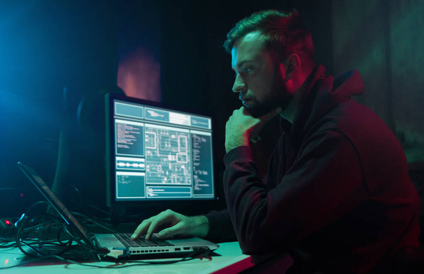 Hackers making cryptocurrency fraud using virus software and computer interface. Blockchain cyberattack, ddos and malware concept. Underground office background. - Fotó, kép