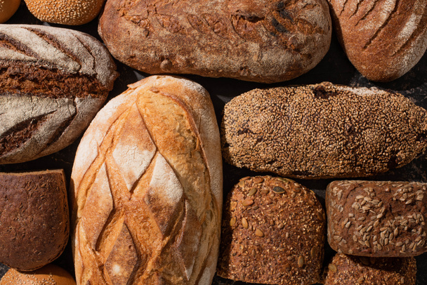 top view of fresh baked bread loaves - Zdjęcie, obraz