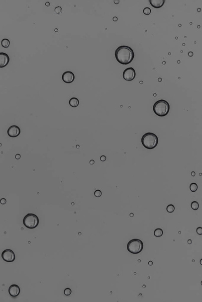 Rain water drops  on clear window.  Natural Pattern of raindrops. Autumn  depressive background - Photo, Image