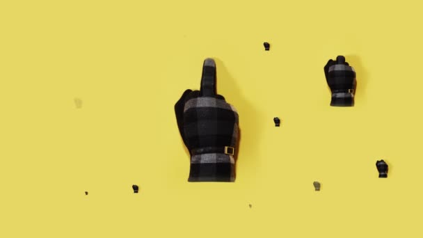 The hands show the middle finger on a yellow background - Materiał filmowy, wideo