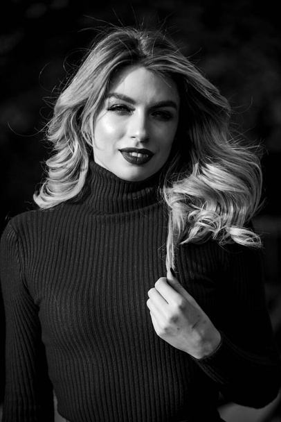 No rush. female beauty. haidresser and makeup. fall fashion season. girl long blond hair. girl red lipstick in knitwear sweater. cosmetics and skin care trend. autumn woman curly hair outdoor - Foto, Imagem