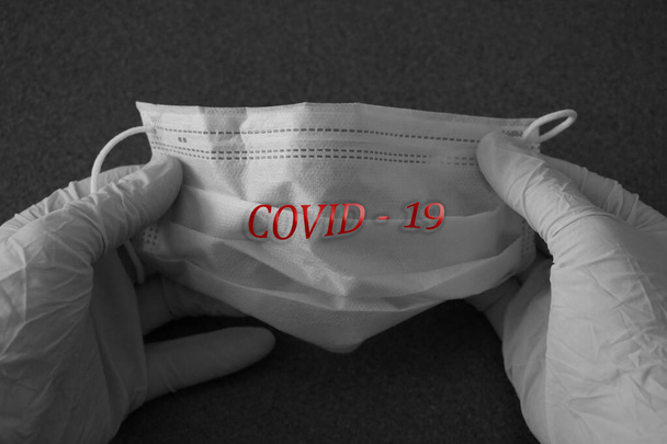 Medizinische Maske. Coronavirus-Pandemie. Coronaviren-Influenza, gefährliche Grippe, Mikroskopvirus aus nächster Nähe, Coronavirus-Pandemie. Coronavirus 2019-nCoV - Foto, Bild