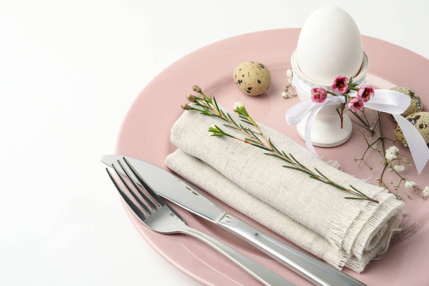 Festive Easter table setting with beautiful floral decor, closeup - Фото, изображение