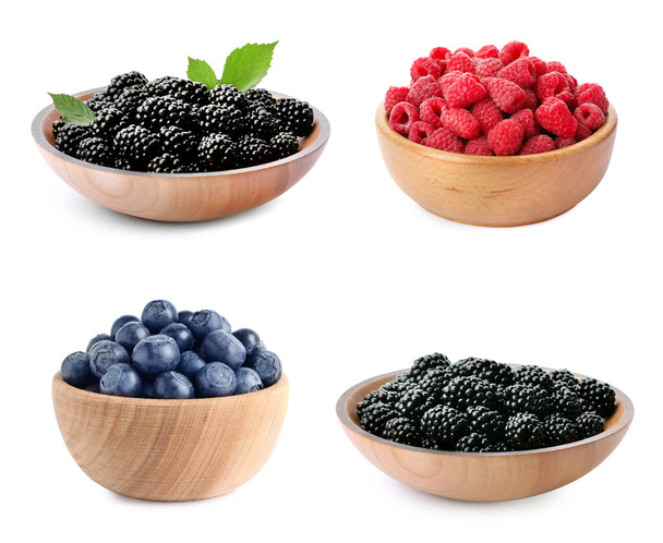 Set of bowls with different fresh berries on white background - Fotografie, Obrázek