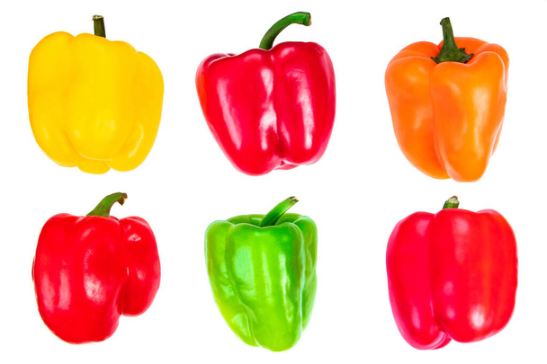 Colorful bell peppers isolated on white background. Fresh vegetables, bio food concept, top view - Photo, Image