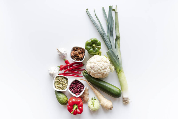 Top view of fresh group of vegetables on white background. Copy space - Photo, Image