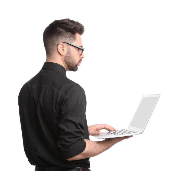 Young businessman with laptop on white background - Foto, afbeelding