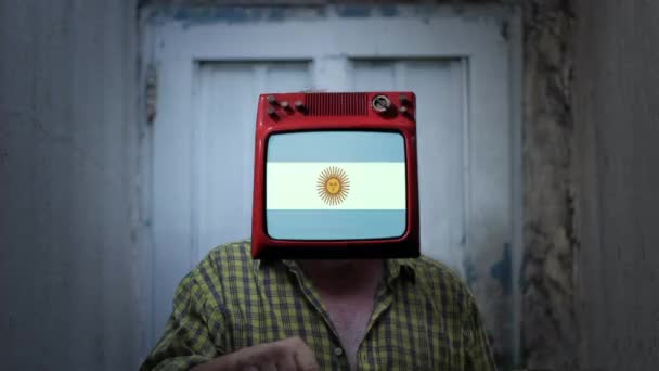 Vlag van Argentinië in de TV Hoofd van een man.  - Video