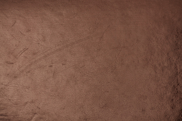 dunkles Grunge zerkratztes Leder als Hintergrund - Foto, Bild
