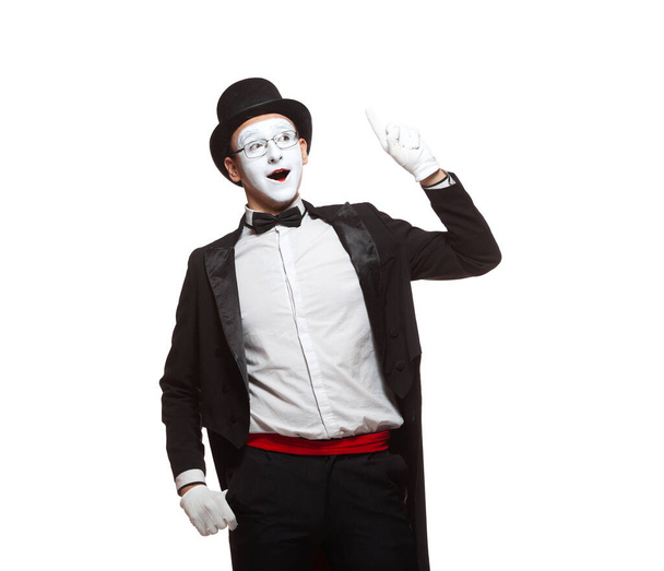 Portrait of a male mime artist performing, isolated on white background. Symbol of an idea, insight, Eureka - Фото, изображение