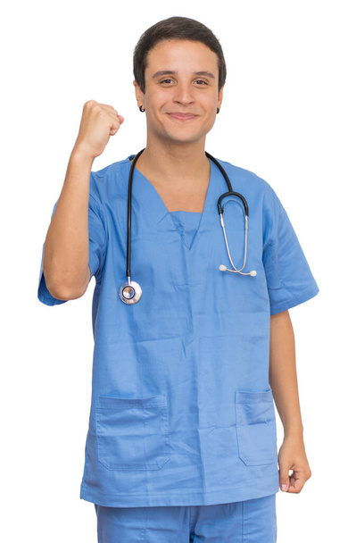 Cheering medical male student with short hair at work isolated on white background for cut out - Photo, Image