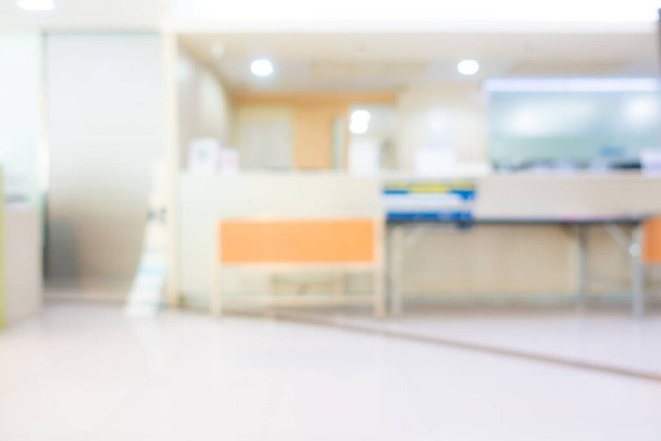 Abstrakte Unschärfe und Defokussierung Bokeh Klinik Krankenhaus Lobby mit Patienten gefundenes Fressen Bereich Innenraum für das Gesundheitswesen Hintergrund - Foto, Bild