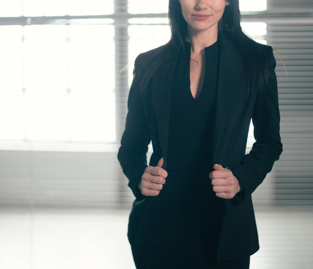young businesswoman standing in a bright office - Photo, image