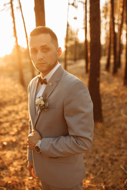 young handsome   man, groom  posing in park - Φωτογραφία, εικόνα