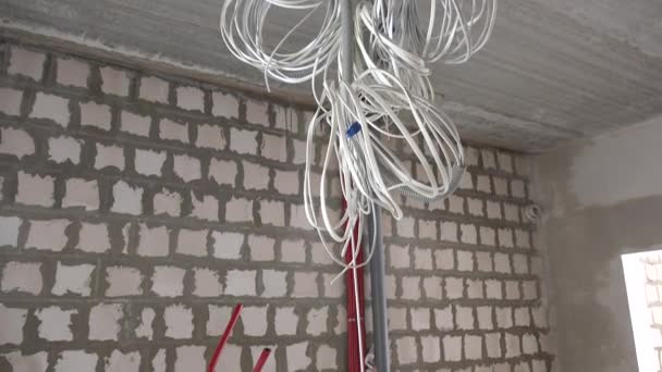 Electrical installation of wires on building site - Footage, Video