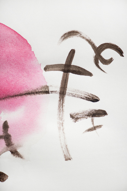 Japanese painting with hieroglyphs and pink circle on white  - Fotó, kép