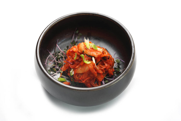 Kimchi, a spicy salad made of pickled Chinese cabbage.Traditional oriental cuisine. - 写真・画像
