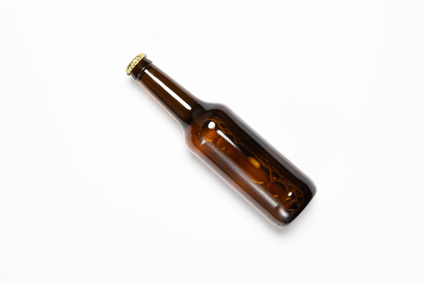 Full brown Beer Bottle Mock-up on white background.High-resolution photo - Fotoğraf, Görsel
