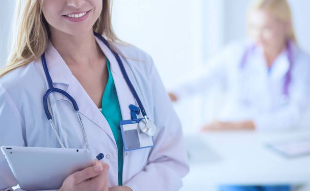 Woman doctor standing with stethoscope at hospital . Woman doctor - Φωτογραφία, εικόνα