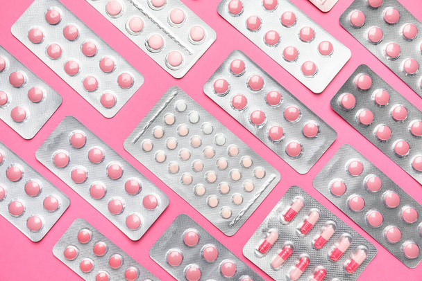 Different pills on color background - Photo, image
