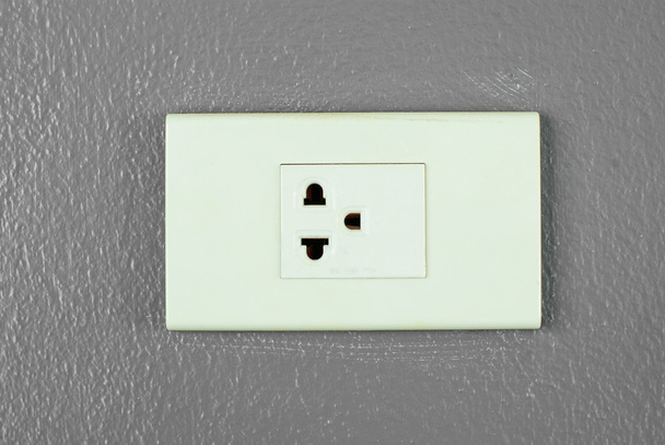 электрическая розетка на стене - Фото, изображение