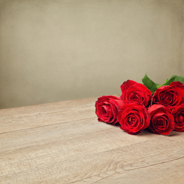 Romantic background with red roses - Фото, изображение