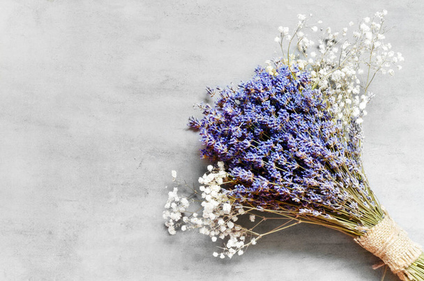 Lavender flowers bouquet on pastel gray background. Flat lay, top view. - Photo, Image