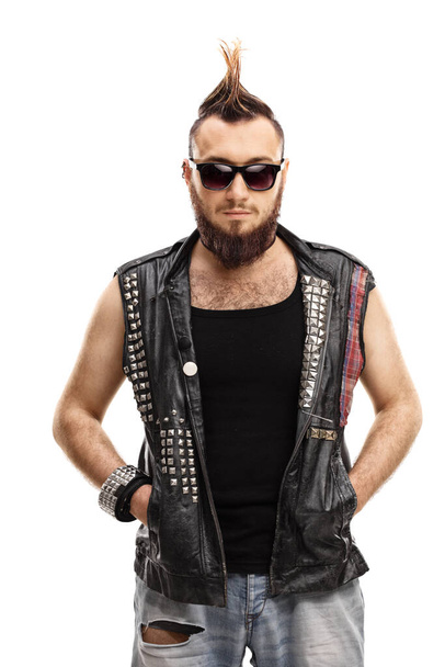 Young punk with a mohawk hair style and sunglasses isolated on white background  - 写真・画像