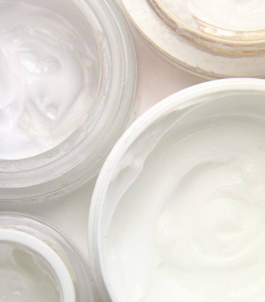 Mélange de crèmes visage pour une belle peau, isolée sur fond blanc
 - Photo, image
