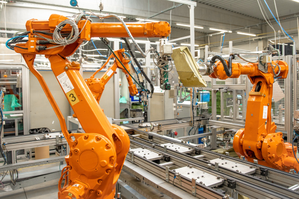 the use of robot arms in intelligent industrial factories - Photo, Image