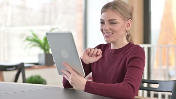 Online Video Chat on Tablet by Young Woman in Office - Video