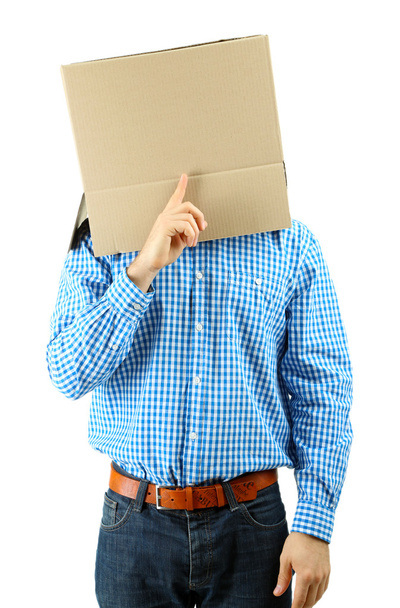 Man with cardboard box on his head isolated on white - Zdjęcie, obraz