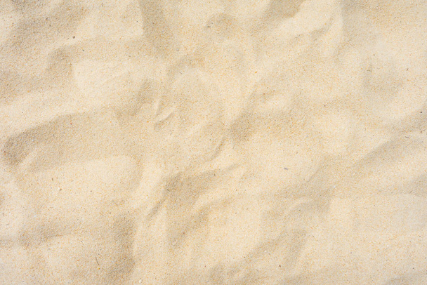Close up sand texture at beach in summer sun as background - Fotó, kép