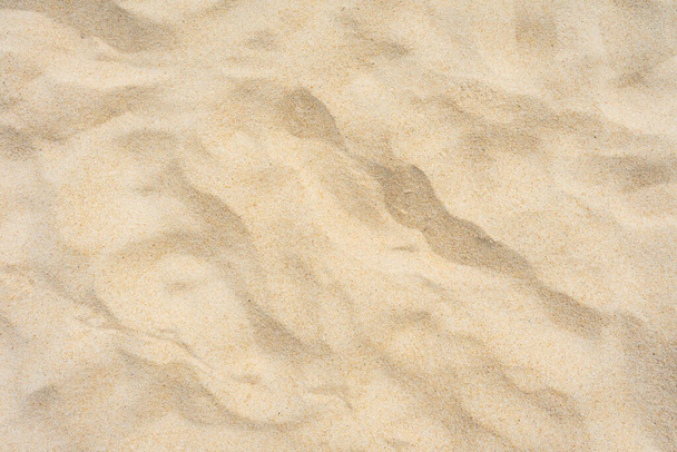 Yaz güneşinde kumsaldaki kum dokusunu arka plan olarak kapat - Fotoğraf, Görsel