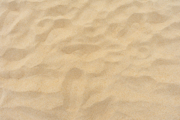 Vollständiger Rahmen aus Sand am Strand als Hintergrund - Foto, Bild