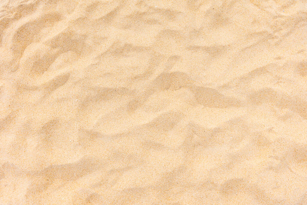 Hintergrund und Textur, Close-uo Strand Sand Textur in der Sommersonne als Hintergrund. - Foto, Bild