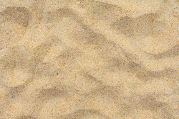 тонка пляжна піщана текстура в літньому сонці як фон
 - Фото, зображення